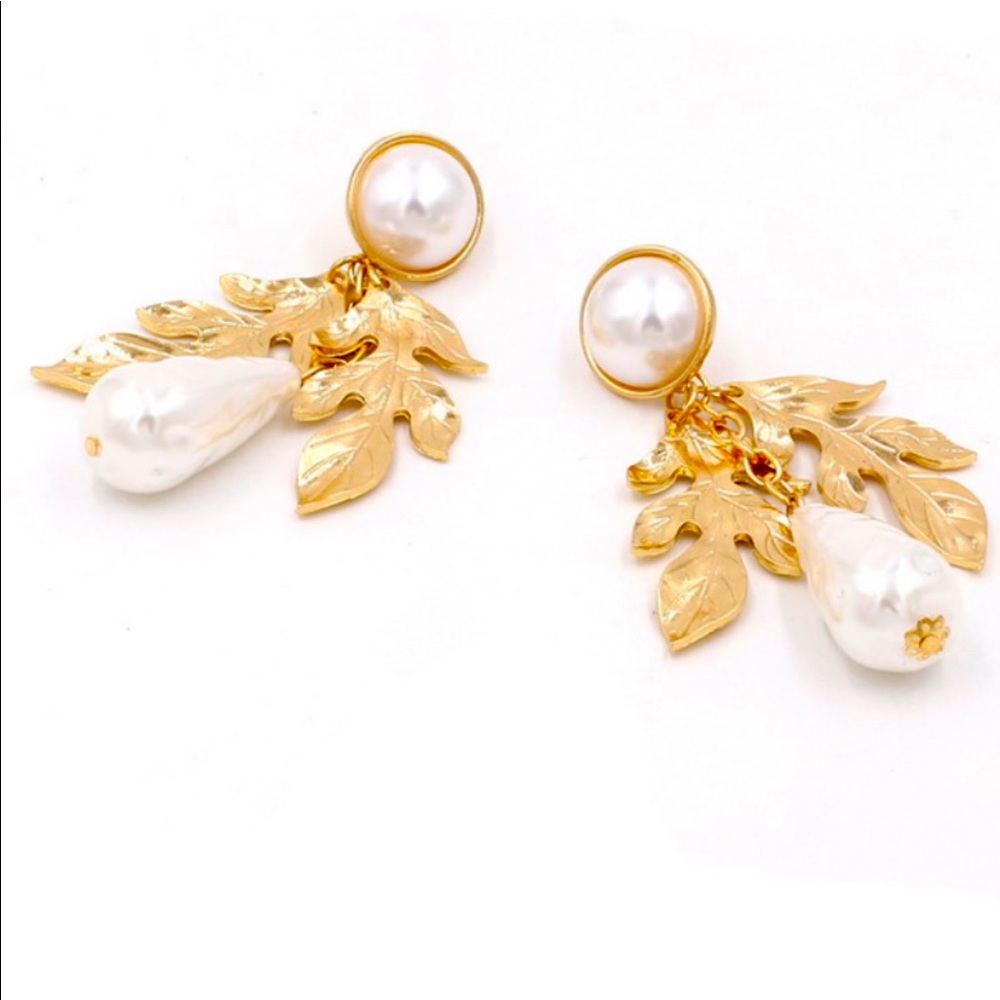 Beautiful dangling pearl in gold earrings